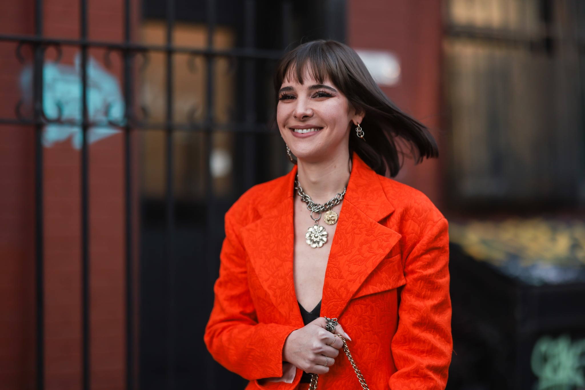 NEW YORK, NEW YORK - FEBRUARY 11: Hari Nef is seen wearing a red two piece is seen outside Proenza Schouler during New York City Fashion Week on February 11, 2022 in New York City. (Photo by Jeremy Moeller/Getty Images)