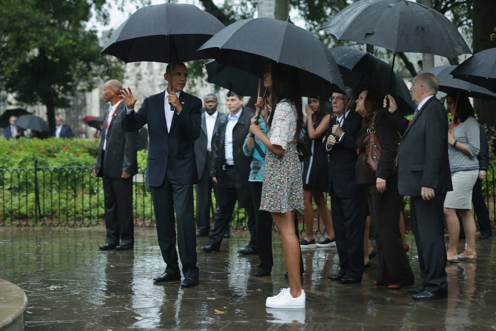 The first family chatted in front of a statue of Cuban independence hero Carlos Manuel de Cespedes during a walking tour of the Old Havana neighborhood on March 20.