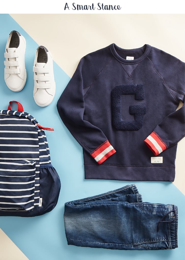 He's comfortably studious in a logo raglan crew sweatshirt ($29.95) paired with super soft denim joggers ($39.95), standing tall and strong as he loads his books into a stripe senior backpack ($44.95).
Confidence-boosting tip: Help kids find their “thing” — the passion they can’t get enough of — whether it's a sport, comic-book art, conquering a video game, or playing the tuba. The sense of accomplishment they get through mastery is a huge lift.