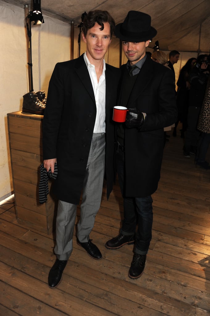 Benedict Cumberbatch managed not to giggle at Dominic Cooper's hat when the pair attended a Bally party in 2013.