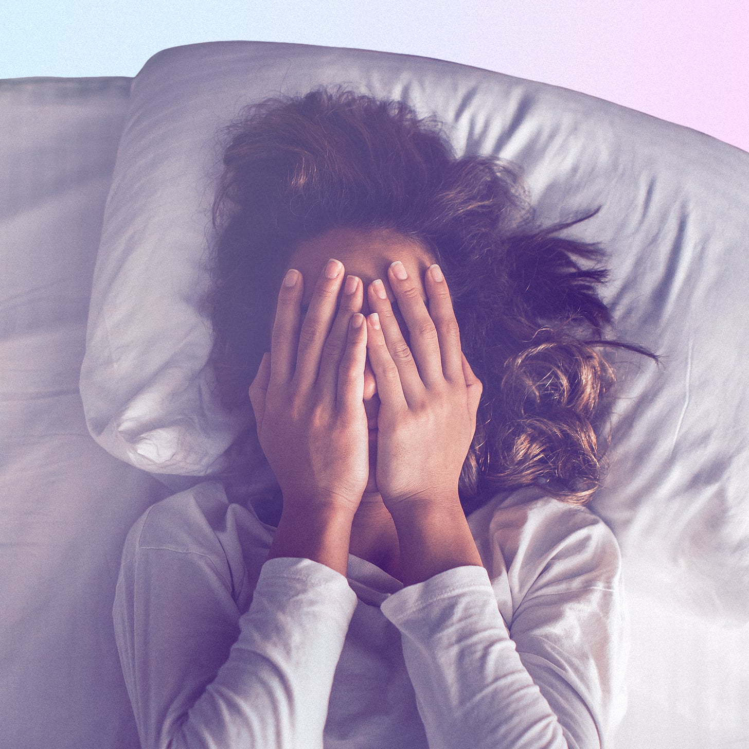 Woman laying down after waking up dizzy