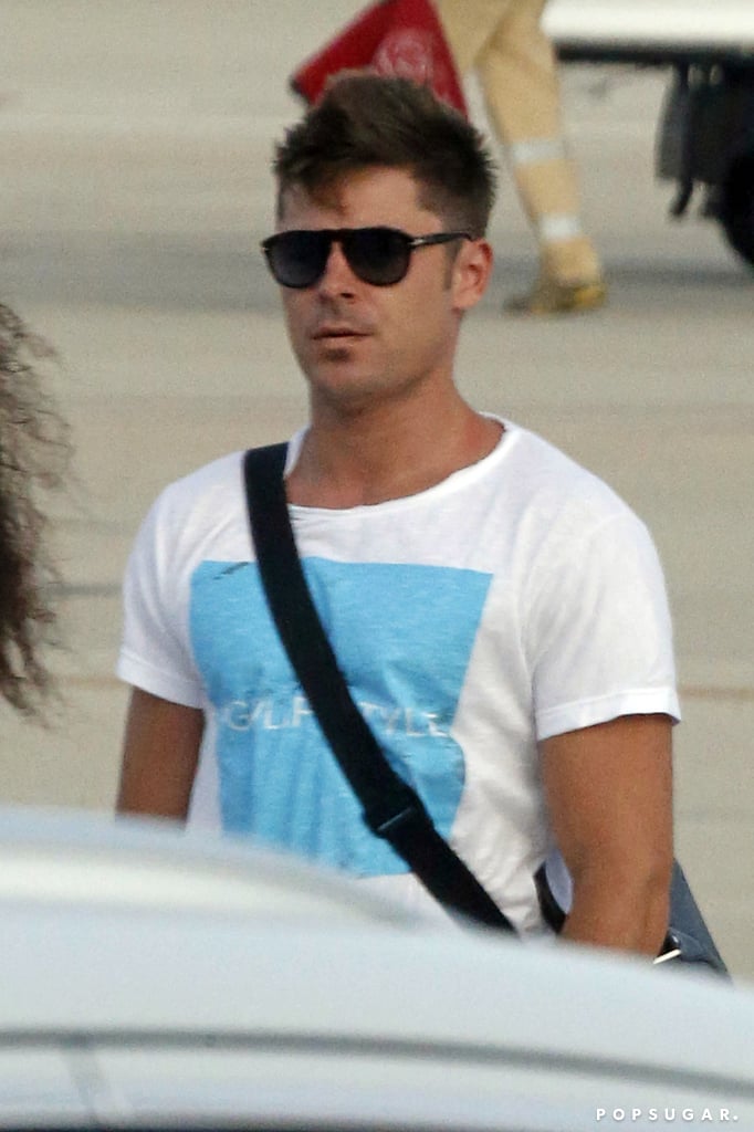 Zac's tan was on display at the airport.