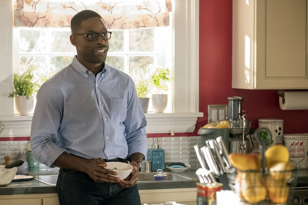Randall is looking especially good in that button-down shirt as he eats breakfast.