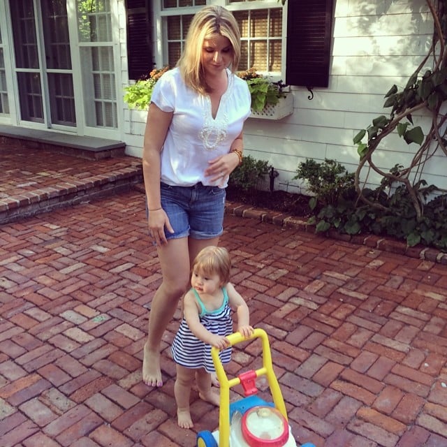 Mila Hager practiced her walking skills (and lawn mowing) with her mom, Jenna Bush Hager, trailing behind.
Source: Instagram user jennabhager