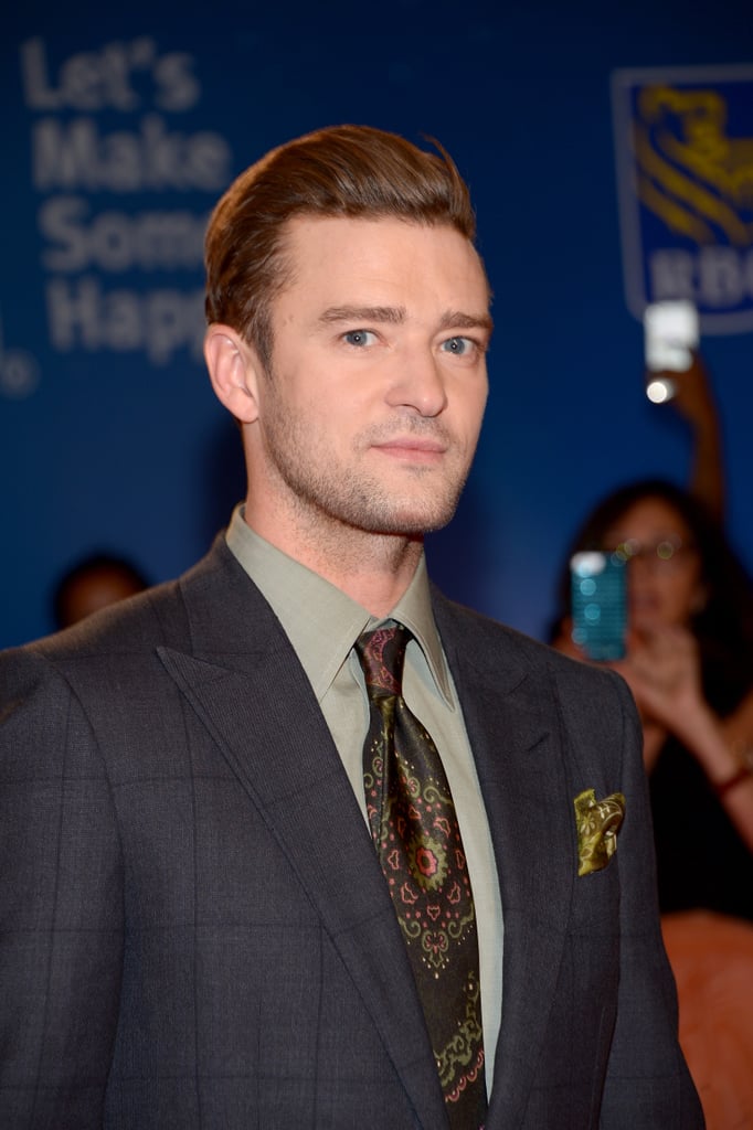 The Toronto Film Festival got a whole lot hotter when Justin Timberlake arrived for the premiere of his concert documentary, Justin Timberlake + the Tennessee Kids, on Tuesday. The "Can't Stop the Feeling" singer brought his signature charm and golden sense of humor to the red carpet, where he joined director Jonathan Demme for pictures. While doing press, Justin was asked whether he heard ex-girlfriend Britney Spears's comment about wanting to collaborate and told E! News, "She did? Sure! Absolutely, absolutely. I have a 17-month-old so I don't get the headline news. I apologize for not being in the know . . . I'm accessible, give us a call!"
Britney admitted that she'd like to work with Justin, who is "very good," when she appeared on Most Requested Live With Romeo back in August, and once former *NSYNC band member Lance Bass got word of this, he couldn't help but share his excitement over the possible collaboration. He gushed to E! News, "I would love to see that happen, of course. I think everyone in the world wants to see them together again in any capacity. It's like everyone's childhood dream."