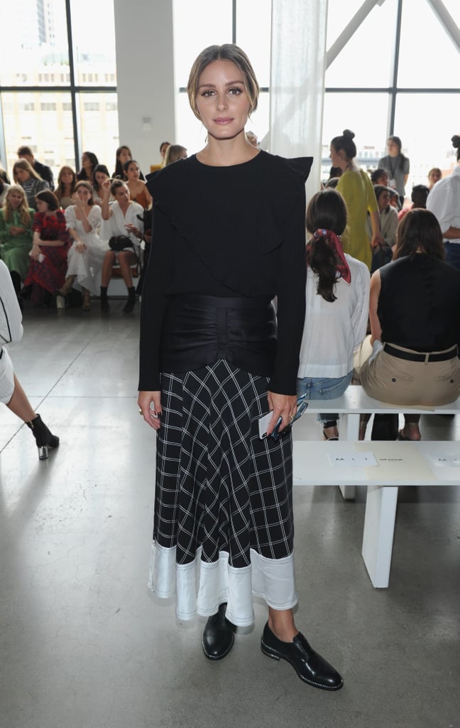 Olivia tempered a full-length skirt and romantic top with patent brogues at the Self-Portrait show.