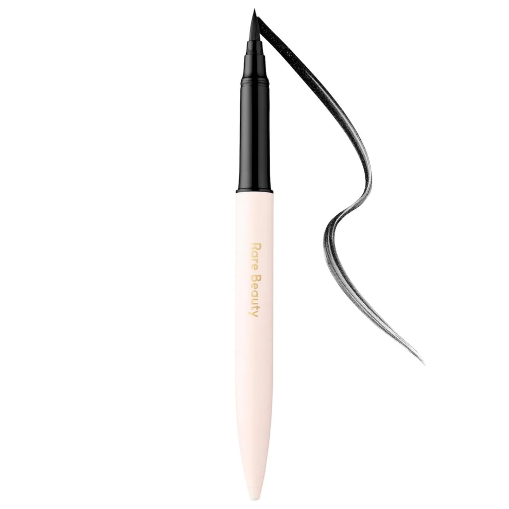 Rare Beauty Perfect Strokes Matte Liquid Liner ($22)
All gothic, scary, and witchy costumes go hand in hand with a heavy dose of black eyeliner. Whether you're drawing a sharp wing or fake stitches on your cheeks, the precision point of this pen will give you the confidence to pull off any creation.