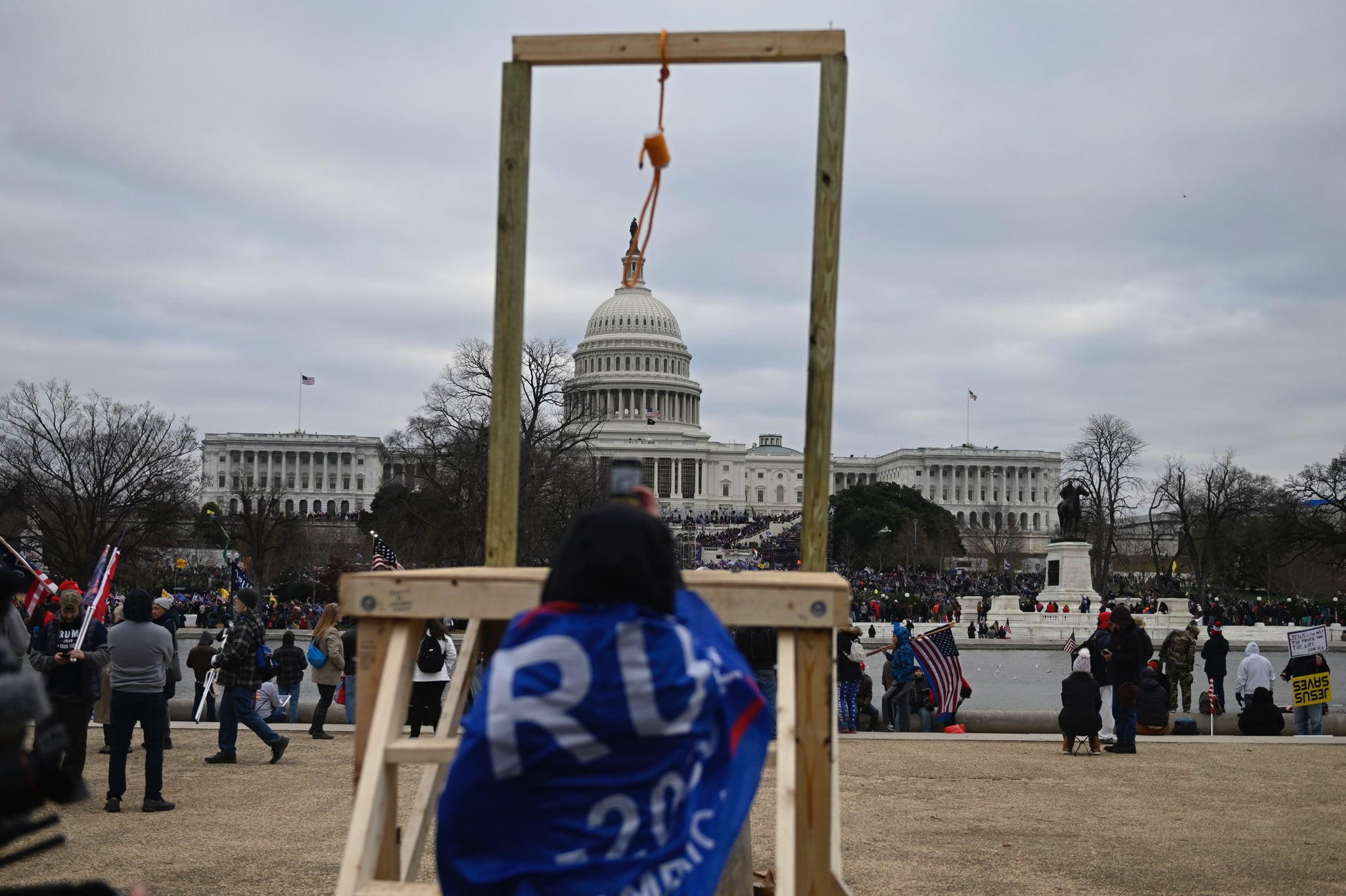 TOPSHOT - Supporters of US President Donald Trump gather across from the US Capitol on January 6, 2021, in Washington, DC. - Demonstrators breeched security and entered the Capitol as Congress debated the a 2020 presidential election Electoral Vote Certification. (Photo by ANDREW CABALLERO-REYNOLDS / AFP) (Photo by ANDREW CABALLERO-REYNOLDS/AFP via Getty Images)