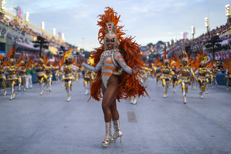 RIO DE JANEIRO, BRAZIL - MARCH 04: A member of Mocidade Independente de Padre Miguel Samba School performs during the parade at 2019 Brazilian Carnival at Sapucai Sambadrome on March 04, 2019 in Rio de Janeiro, Brazil. Rio's two nights of Carnival parades