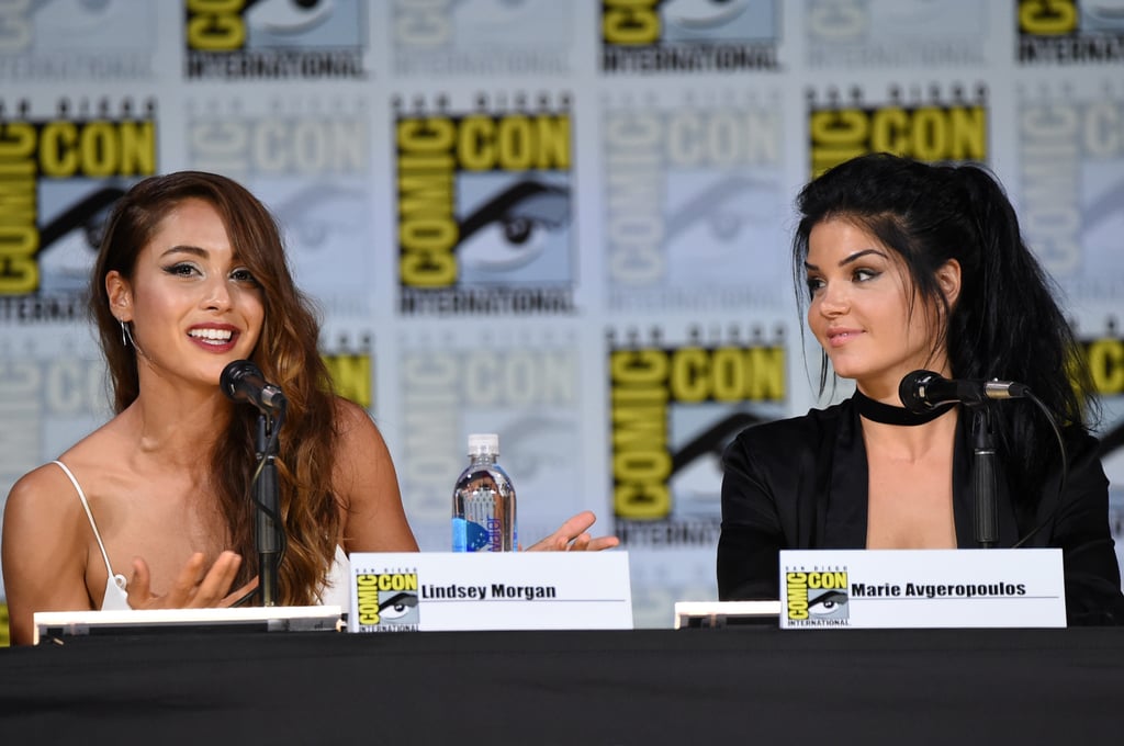 Pictured: Lindsey Morgan and Marie Avgeropoulos.
