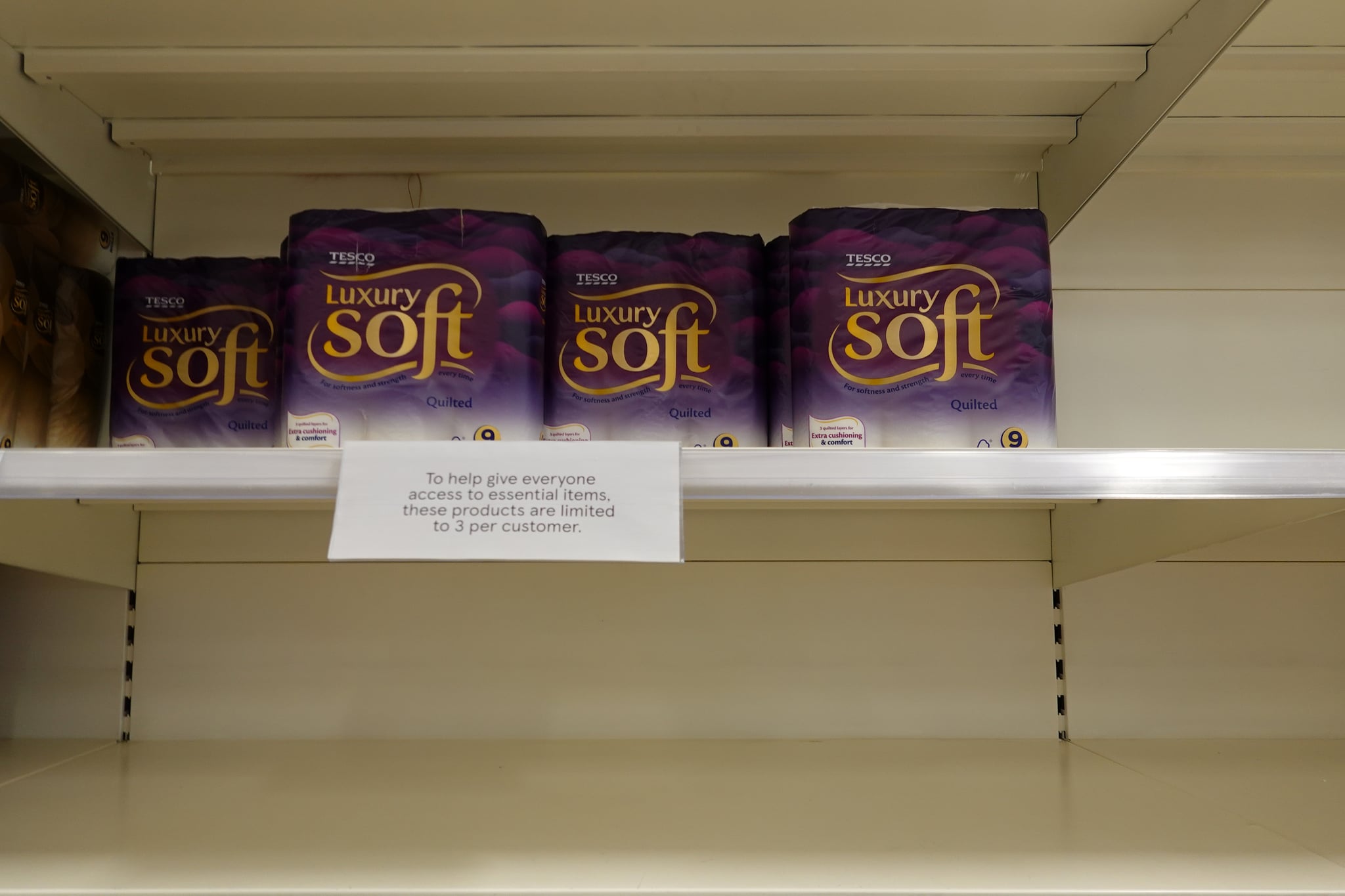 MANCHESTER, ENGLAND - SEPTEMBER 25: A sign limiting three items per customer is displayed in a supermarket on September 25, 2020 in Manchester, England. Tesco and Morrisons supermarkets are the first to initiate rations on essential items amid fears of panic buying with the prospect of a second Covid-19 full lockdown. (Photo by Christopher Furlong/Getty Images)