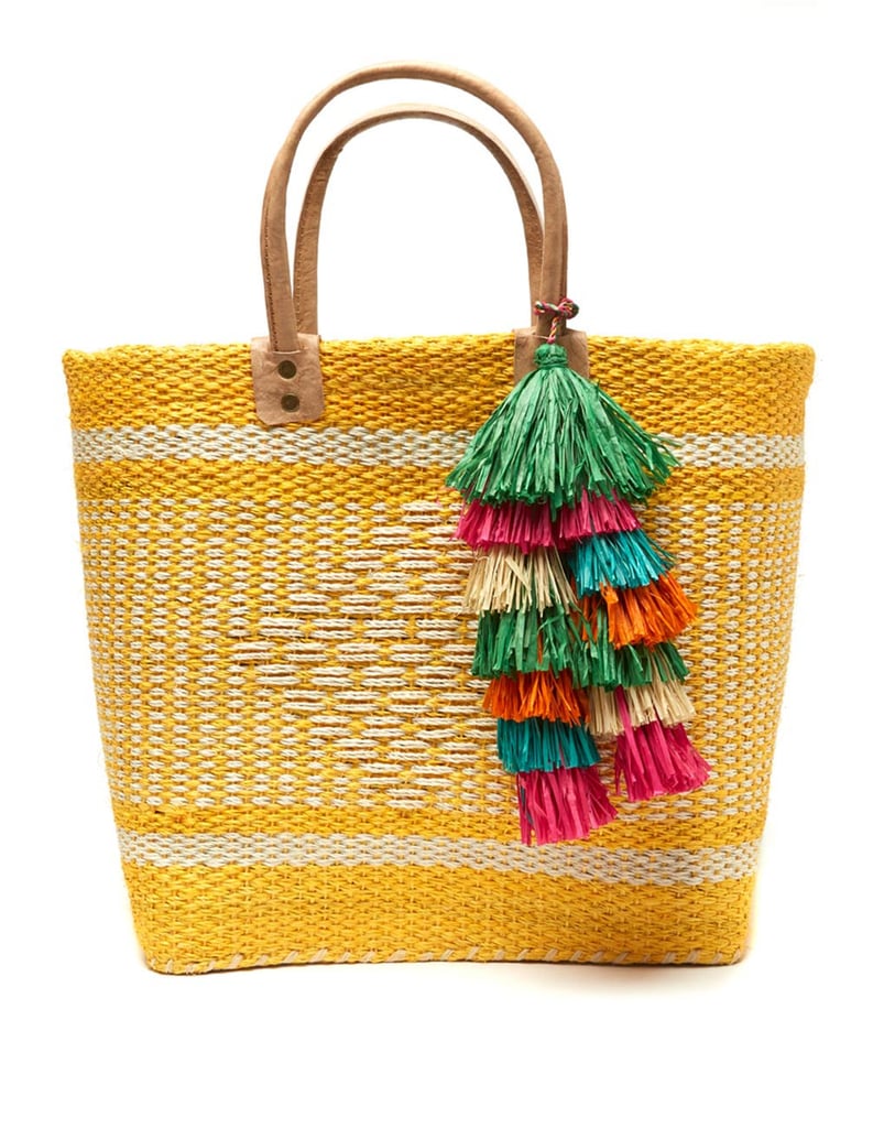 "A lot of my friends travel in the Winter and this is a great gift for anyone who is going somewhere warm! These bags are stylish, durable, and handmade by artisans all over the world. Plus the proceeds go directly back to the artisans and their families. When you're going to the beach, it's the perfect time to accessorize with fun pops of color that you may not wear in day-to-day life. This artisan is from Madagascar and the colors are meant to represent Madagascar's vibrant culture, which I love."  
 The Little Market Beach Bags   ($136)
