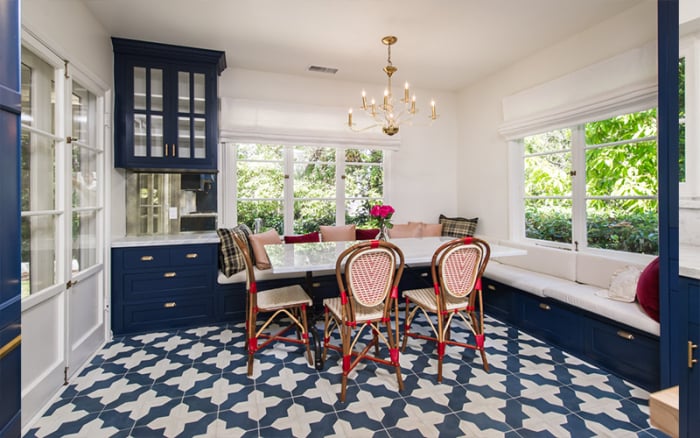 The details are absolutely stunning, from the floor to the cabinets and chairs.