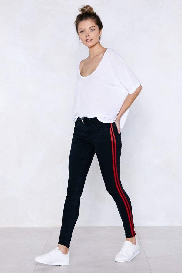 white skinny jeans with black stripe down the side