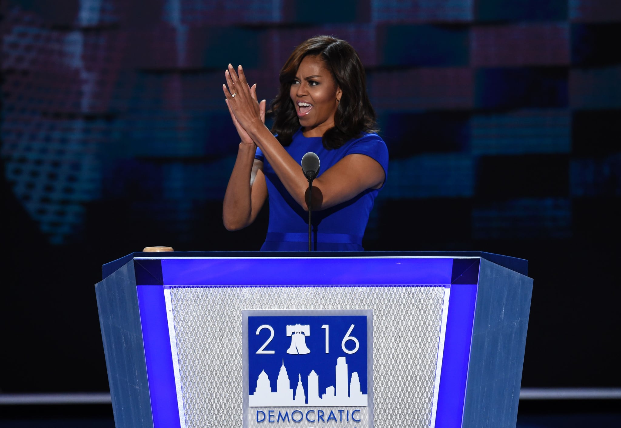 US First Lady Michelle Obama gestures during Day 1 of the Democratic National Convention at the Wells Fargo centre in Philadelphia, Pennsylvania, July 25, 2016. / AFP / SAUL LOEB        (Photo credit should read SAUL LOEB/AFP/Getty Images)