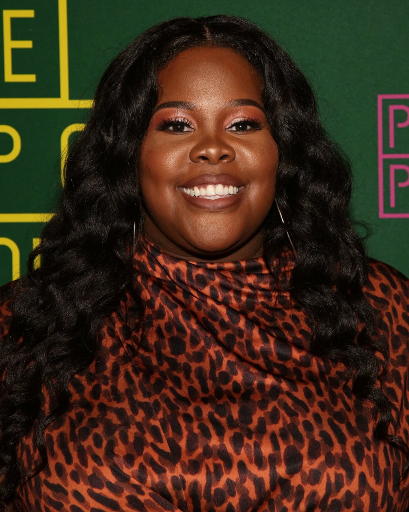 Amber Riley as the Emcee