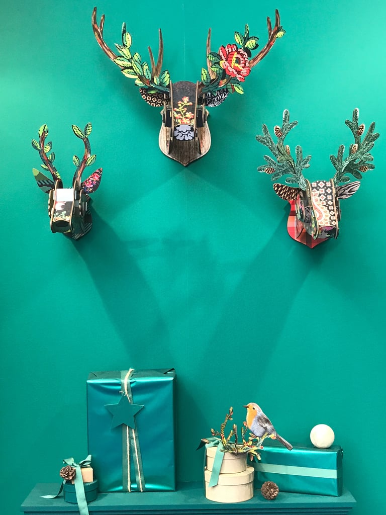 An all-teal wall looks elegant and whimsical.