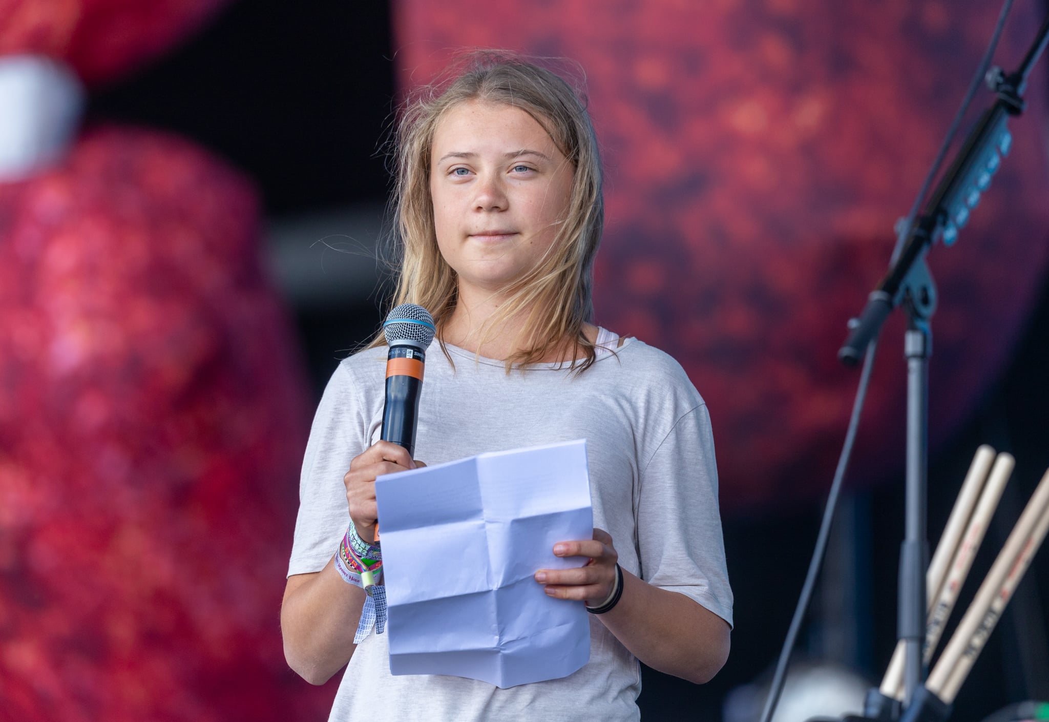 GLASTONBURY, ENGLAND - JUNE 25:  Greta Thunberg speaks to the crowd from the main Pyramid Stage at the 2022 Glastonbury Festival during day four of the Glastonbury Festival at Worthy Farm, Pilton on June 25, 2022 in Glastonbury, England. The festival, founded in 1970, has grown into one of the largest outdoor green field festivals in the world.  (Photo by Matt Cardy/Getty Images)