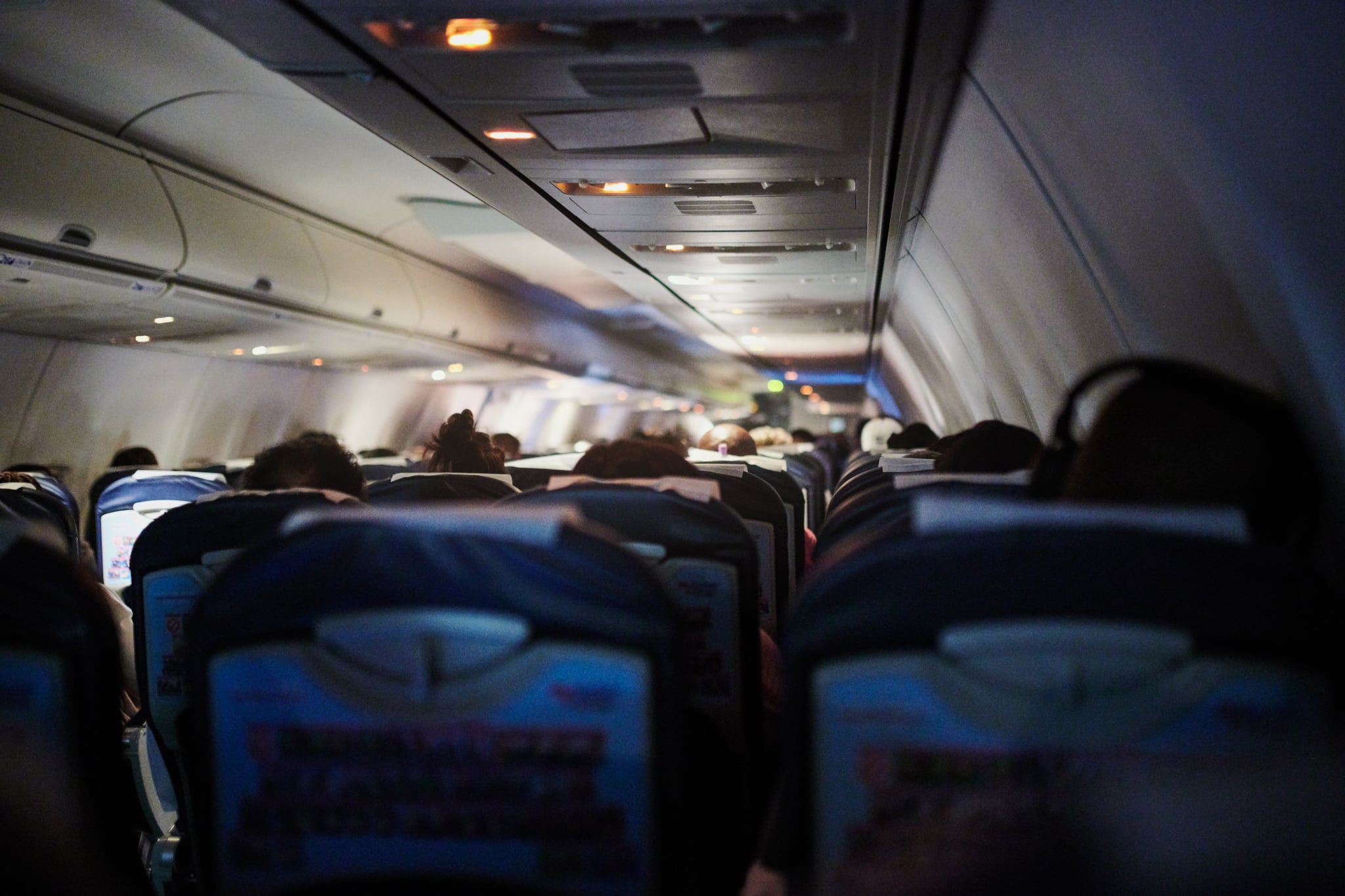 A dark image shows rows on a plane.