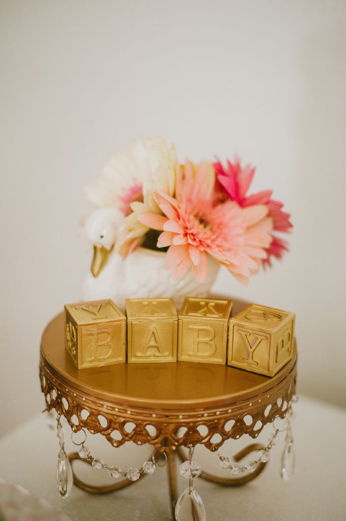 The gilded baby blocks added a sophisticated flare to typical baby-shower decor.