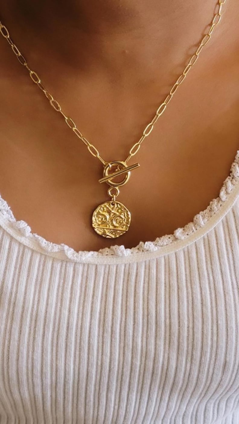 Simple Yet Chic: Saharas Essentials Moon and Star Gold Coin Necklace