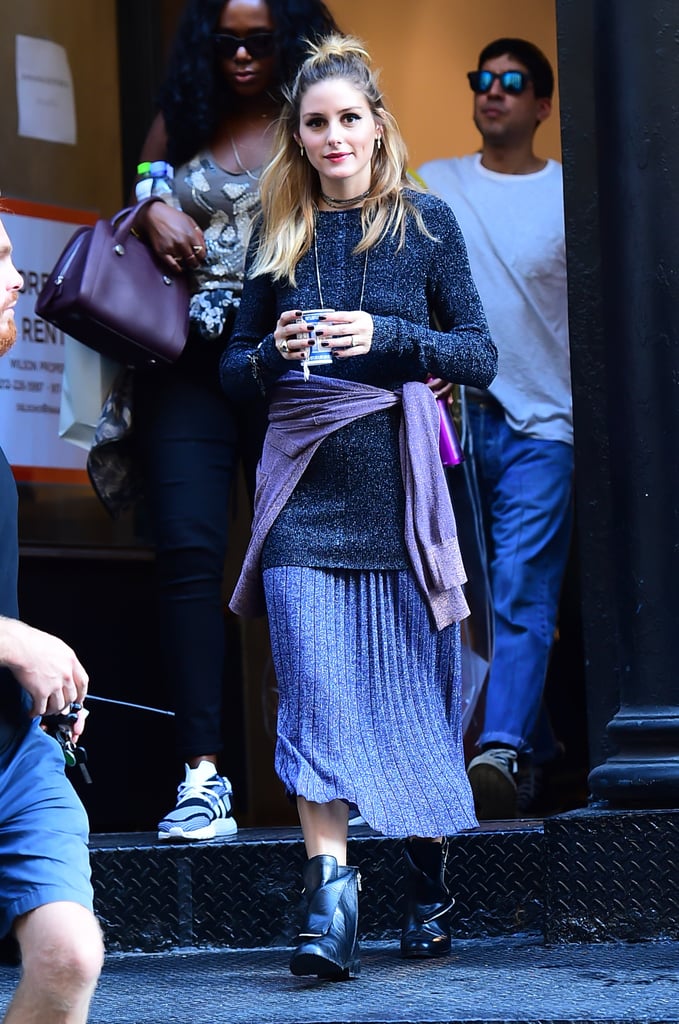 A sparkly knit set sounds a little much, until you give it the Olivia Palermo treatment with plenty of layered chokers, a loose, messy bun, and the addition of a knotted tee around the waist. Boots instead of heels also help to give the ensemble a much more approachable, everyday feel that's entirely wearable and modern.