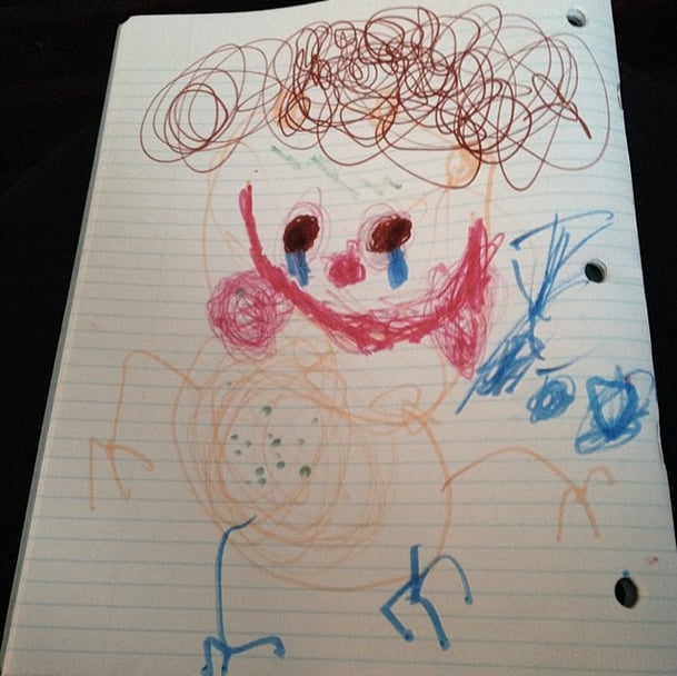 "My son drew a picture of Mommy as I'm sick right now. Complete with germs in my body, watering eyes, and a pile of tissues next to me. But I still sport a smile on my face according to him."