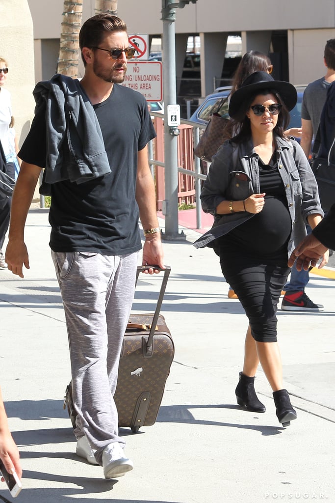 Kourtney Kardashian and Scott Disick walked in step at the Burbank, CA, airport on Saturday.