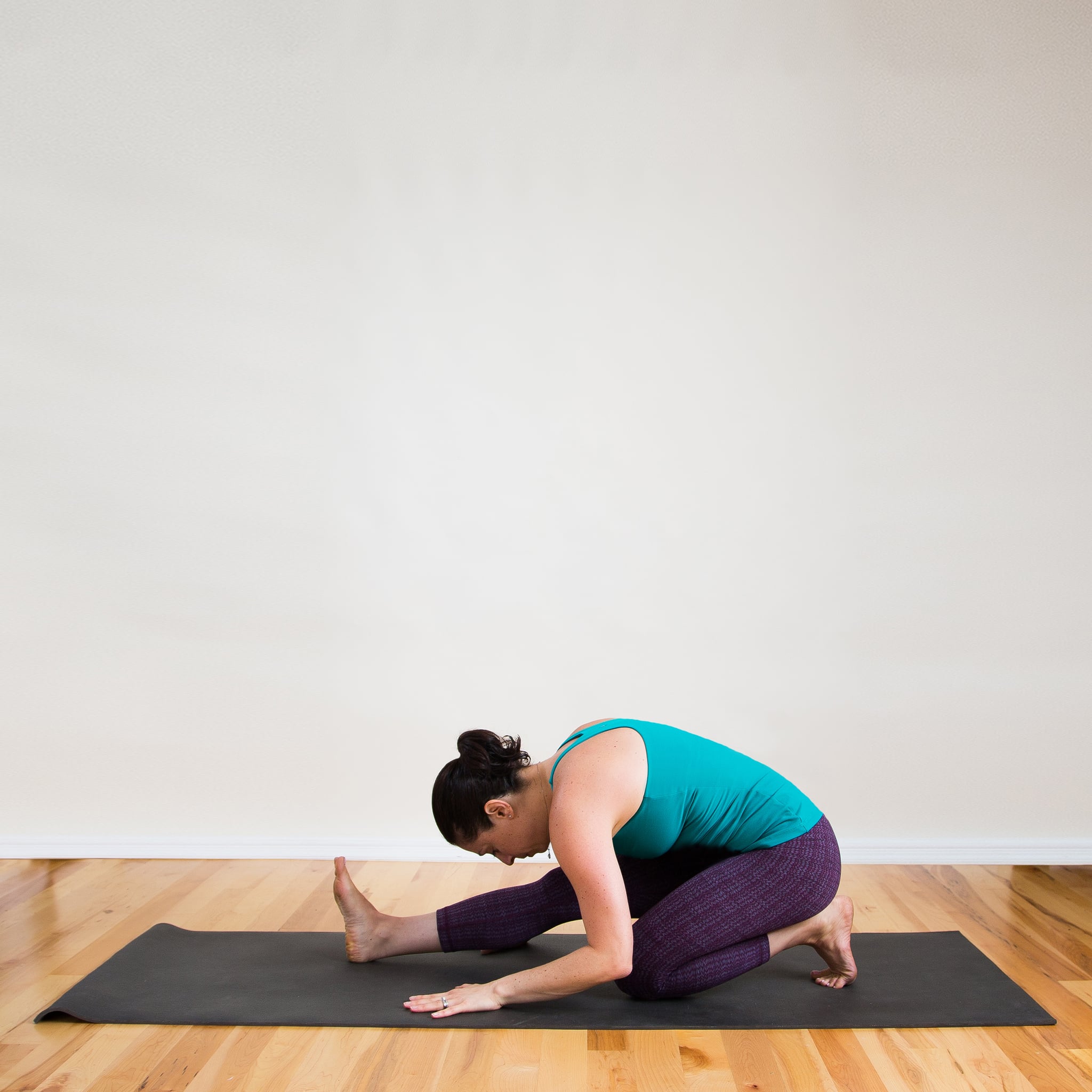 8 Yoga Poses That Stretch Your Quads