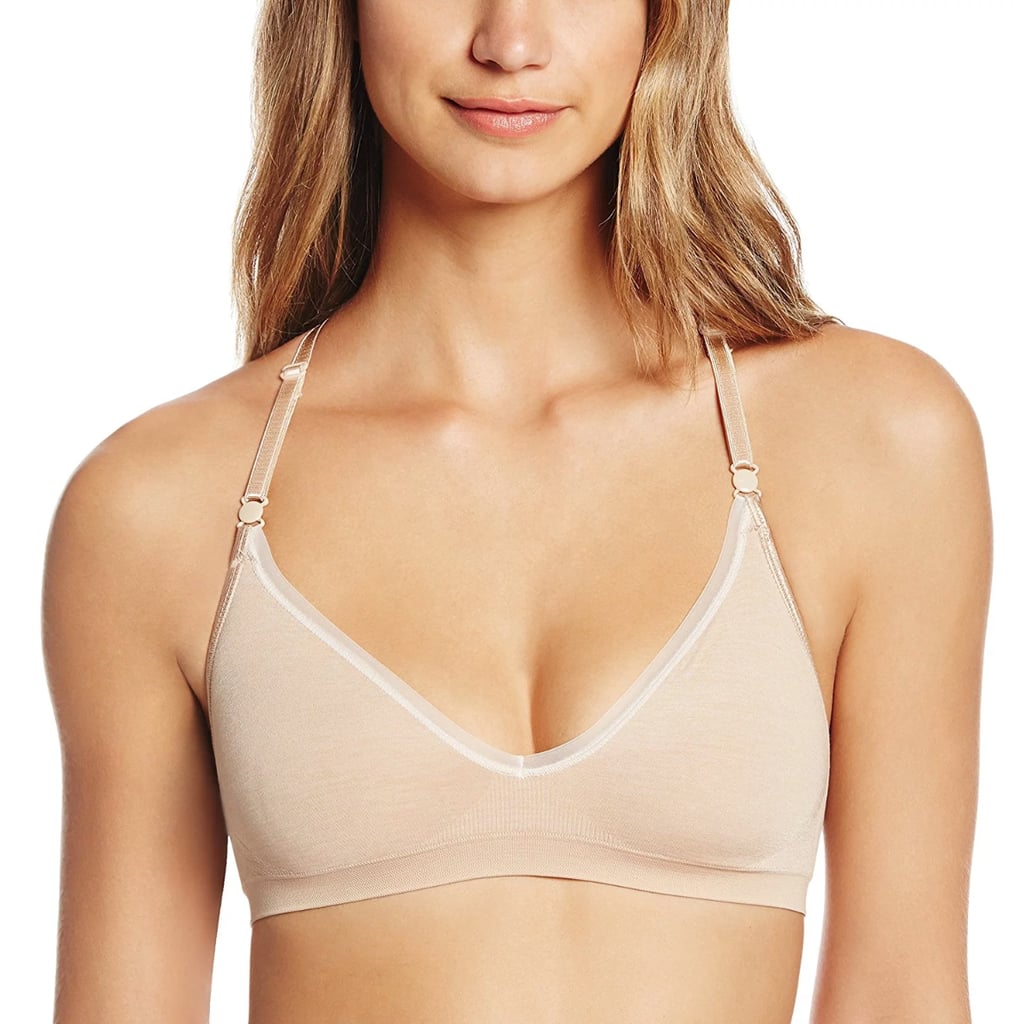 "I have a bust on the smaller side, and I don't need much support. I often find underwire bras are too uncomfortable and thin camis just aren't enough. I saw this Hanes Convertible Wire Free Bra  ($14) bubbling up on Amazon recently and became curious. It had over 1,800 reviews and a 4.5-star rating, so I gave it a try. 
This bra looks small and thin but it offers me so much support. The smooth straps are adjustable and don't cut into my skin, and the material is so silky-soft, I feel like I'm wearing nothing. Now I'm officially throwing out all my other ones and buying this in every colour. The beige one is perfect to pair with all my light-coloured tops, but it comes in four other cute colours, including pink. At this price, you can buy them all!" — KJ