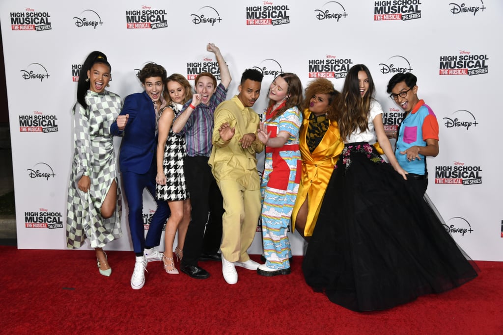 What time is it? Premiere time! On Friday, the cast of High School Musical: The Musical: The Series hit up Walt Disney Studio Lot in Los Angeles to celebrate the show's debut. Stars such as Sofia Wylie, Joshua Bassett, and Olivia Rodrigo were dressed to the nines as they posed with fellow costars on the red carpet. There was even a special appearance from original High School Musical star Monique Colman! The actors kept the festivities going at the afterparty where they laughed, embraced, and showed their East High pride.
The series will center around a group of students who are recreating  High School Musical for their Winter theater production. And drama within the drama department is bound to happen. Disney Channel, ABC, and Freeform will air a preview of the show on Nov. 8 before it officially drops on the streaming platform Disney+ on Nov. 12. Look ahead to see more photos from the premiere to prepare for the Wildcats' return!