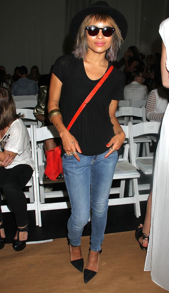 Zoe Kravitz kept it cool and casual in skinny denim, a black tee, pointy pumps, and a red crossbody bag at Sass & Bide.
Zoe Kravitz kept it cool and casual in skinny denim, a black tee, pointy pumps, and a red crossbody bag at Sass & Bide.