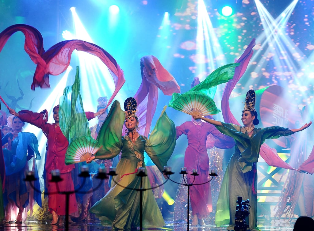 Actors hit the stage for a traditional performance in Surabaya, Indonesia.