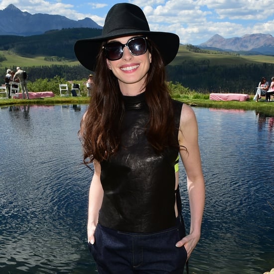 Anne Hathaway's Black Leather Top and Neon Bra at Telluride