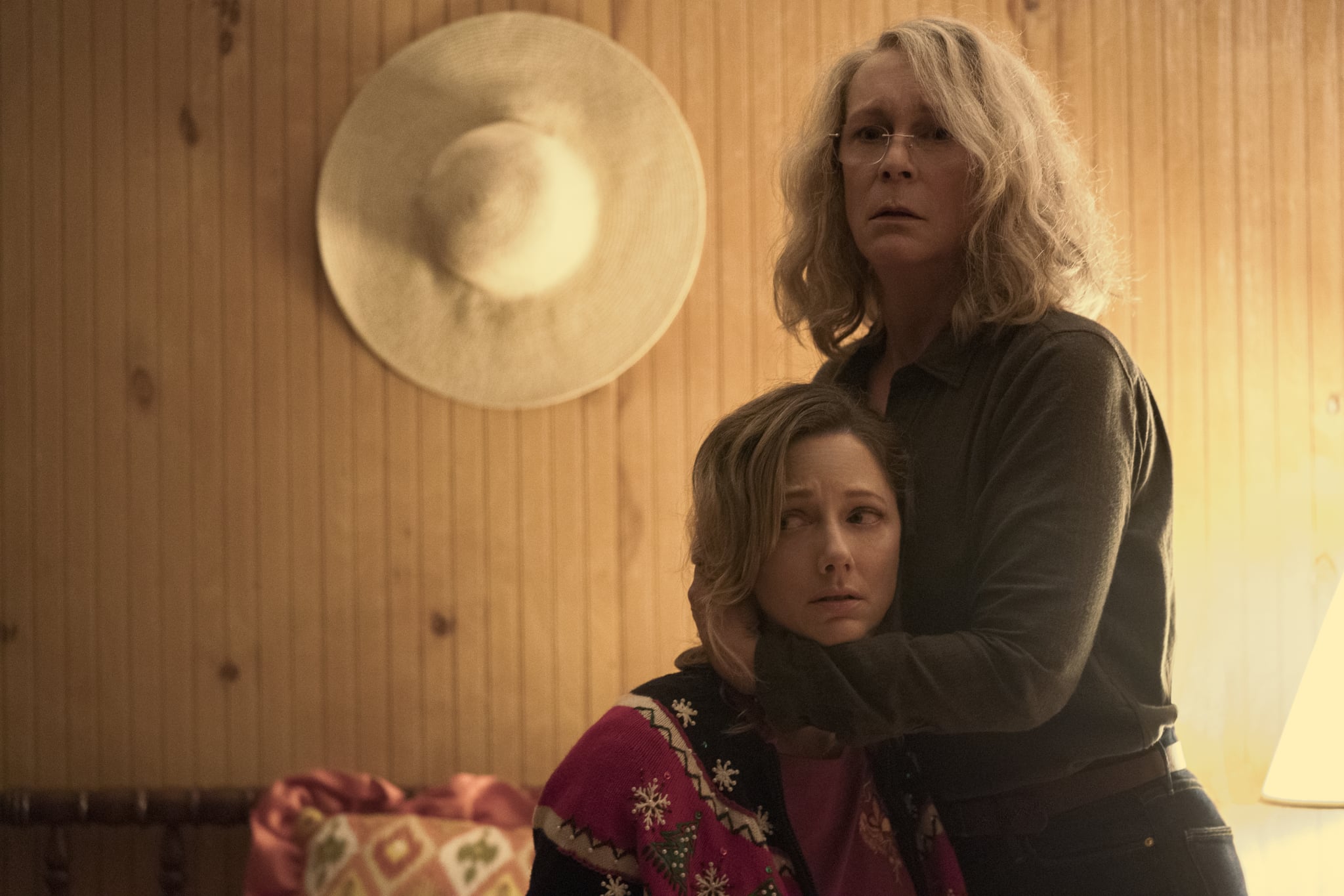 Laurie Strode (Jamie Lee Curtis) tries to protect her daughter Karen (Judy Greer) in 