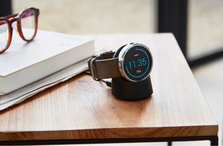 The charging dock itself is wired and plugged into the wall but requires no cords or ports to charge the watch.