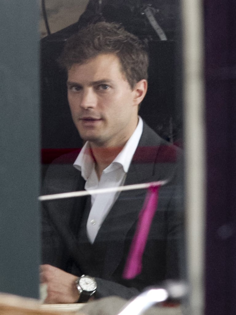 Dornan channeled Christian Grey across from Johnson in the coffee-shop scene.