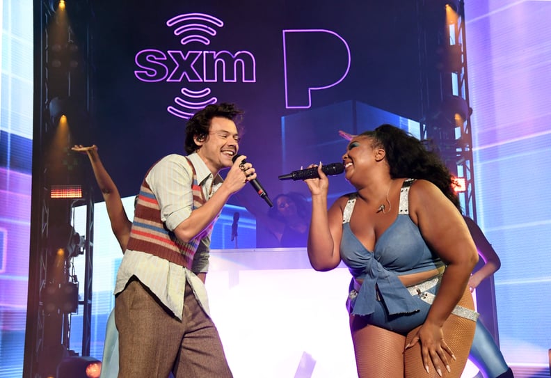 MIAMI BEACH, FLORIDA - JANUARY 30: (L-R) Harry Styles and Lizzo perform an exclusive concert for the SiriusXM and Pandora Opening Drive Super Concert Series, airing live on SiriusXM's The Heat channel, at the Fillmore Miami Beach during Super Bowl Week on