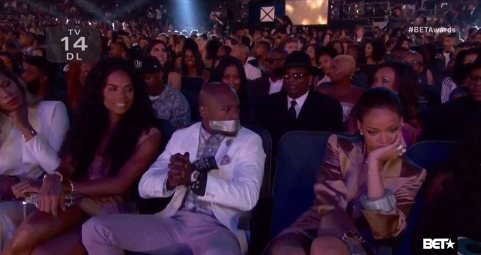 Rihanna Tapes Floyd Mayweather's Mouth Shut | Photos
