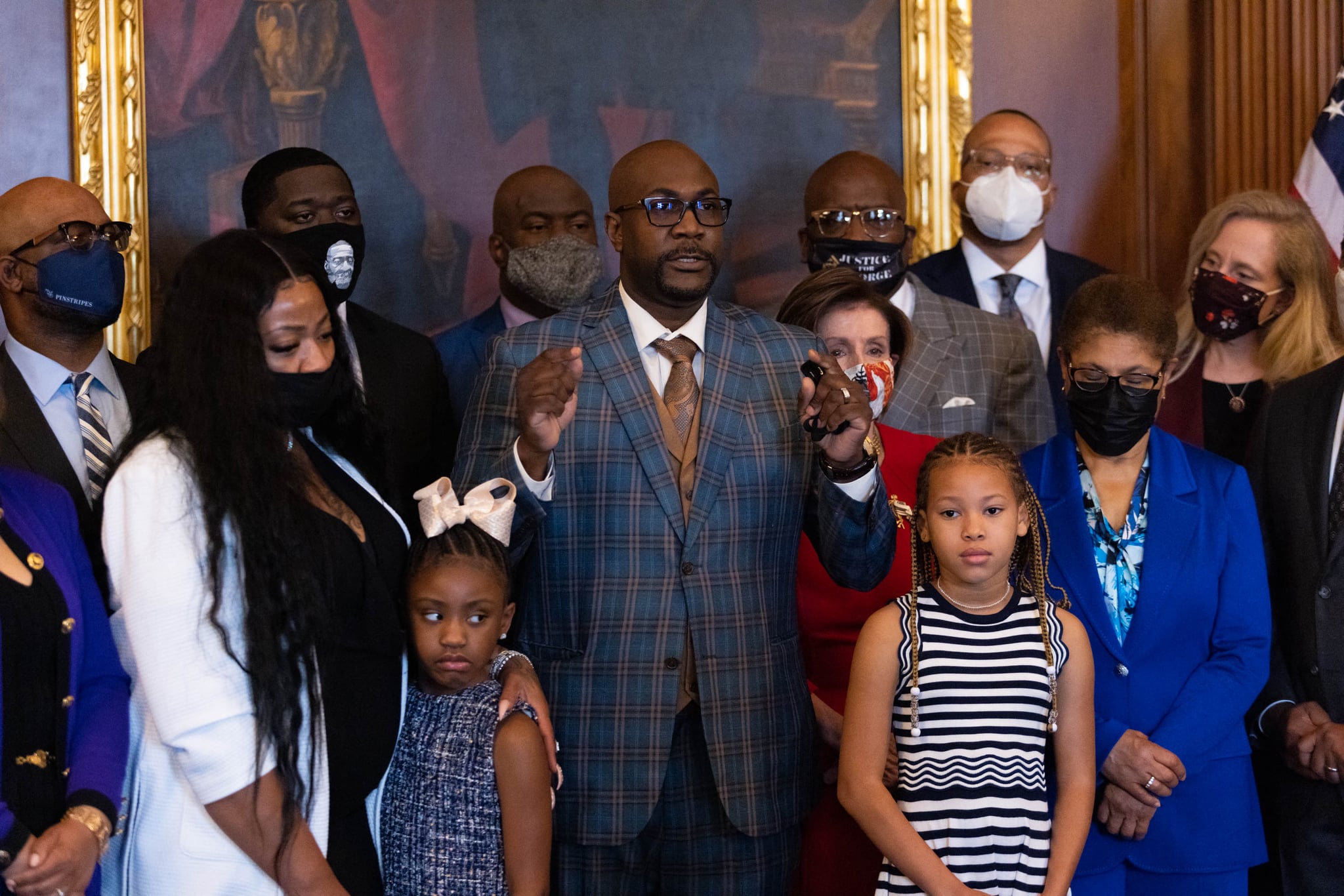 Philonise floyd, brother of George Floyd, speaks to the press  while standing with House Speaker Nancy Pelosi, Dp-CA, other members of the Floyd family prior to a meeting to mark the anniversary of the death of George Floyd, on May 25, 2021, on Capitol Hill, in Washington, DC. (Photo by Graeme Jennings / POOL / AFP) (Photo by GRAEME JENNINGS/POOL/AFP via Getty Images)