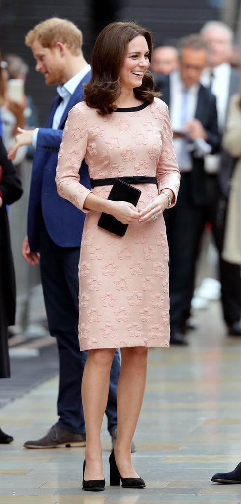 Kate wore this pink Orla Kiely dress to the Charities Forum Event at Paddington Station in October 2017. She accessorized with Tod's black suede pumps and her trusty Mulberry clutch.