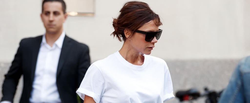 Victoria Beckham Wears White T-Shirt and Blue Pants
