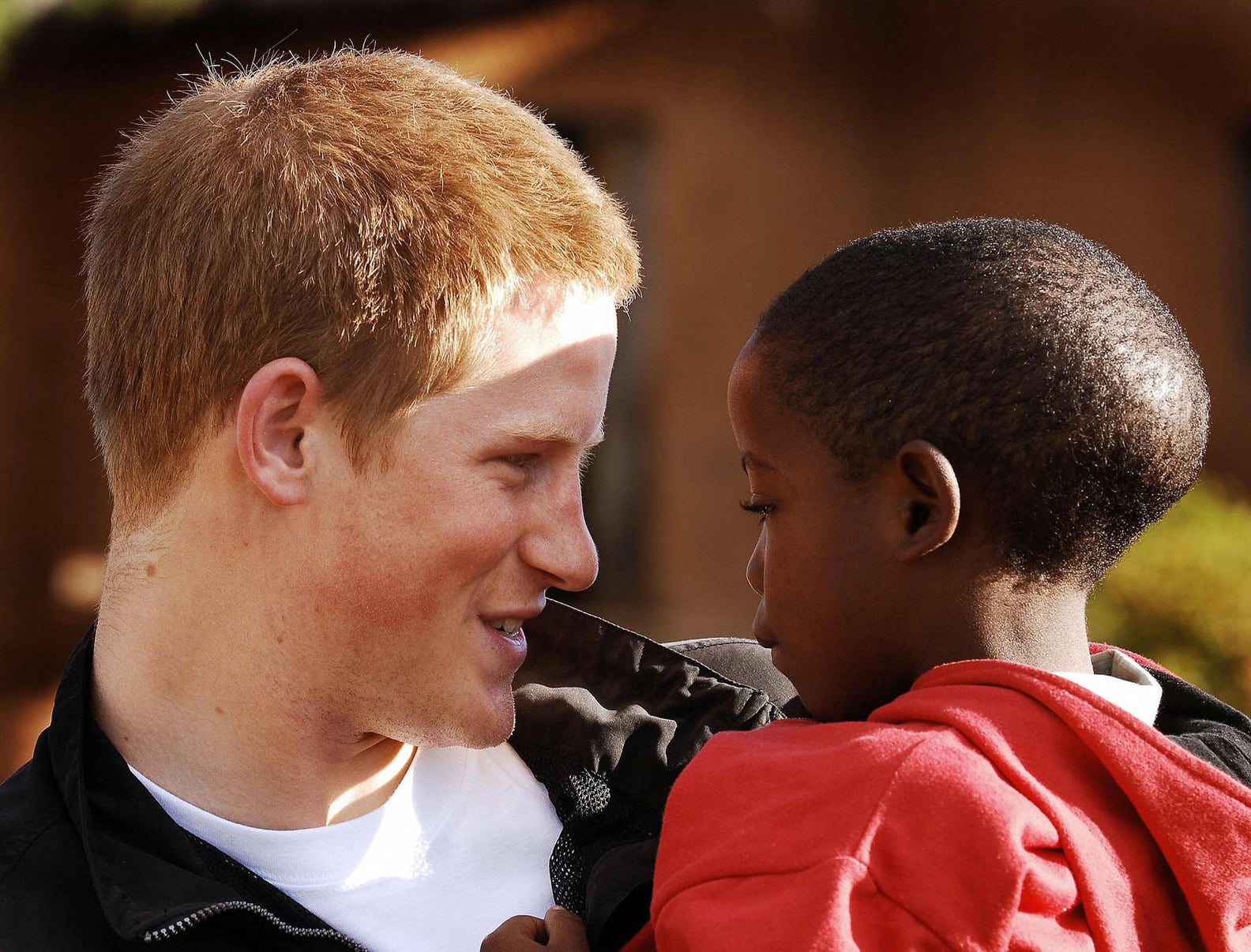 The Cutest Pictures of Prince Harry With Kids | PS Celebrity