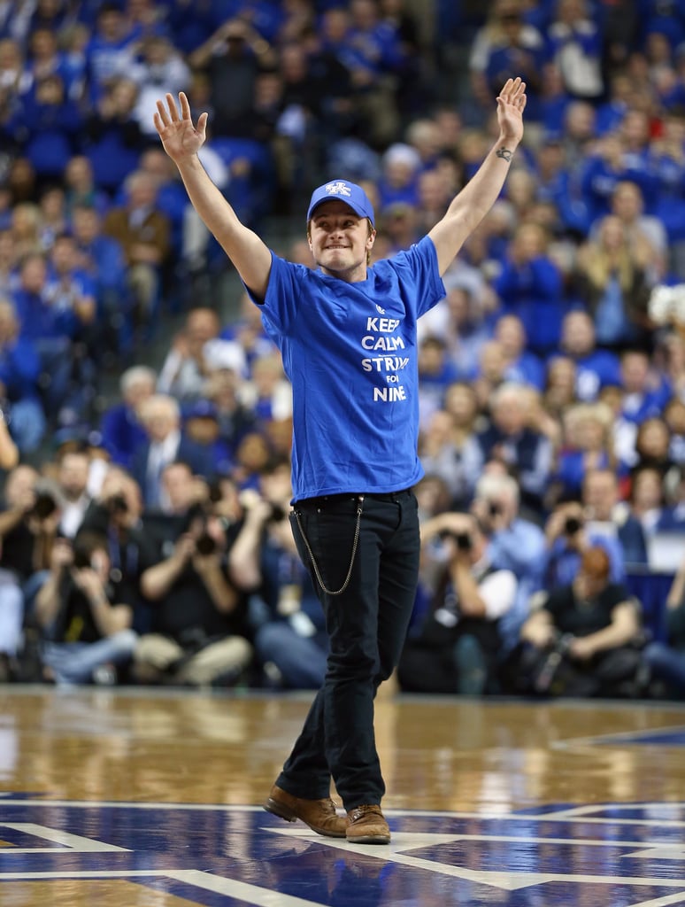 Josh Hutcherson waved to the crowd during a Kentucky Wildcats game on Saturday and was given the signature Mockingjay salute — a solemn, silent three fingers in the air — by thousands of fans.