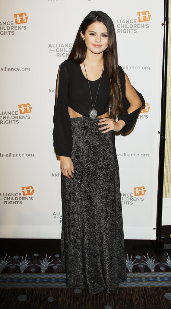 At The Alliance For Children's Rights annual dinner in Beverly Hills, Selena Gomez donned this Lovers & Friends cutout maxi dress ($150, originally $215) with a long silver shield necklace.
At The Alliance For Children's Rights annual dinner in Beverly Hills, Selena Gomez donned this Lovers & Friends cutout maxi dress ($150, originally $215) with a long silver shield necklace.