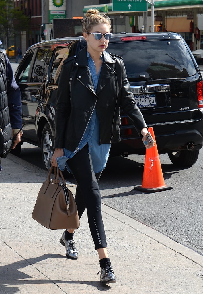 For an outing in SoHo, Gigi elevated black pants with oxfords and a luxe bag in tow.
