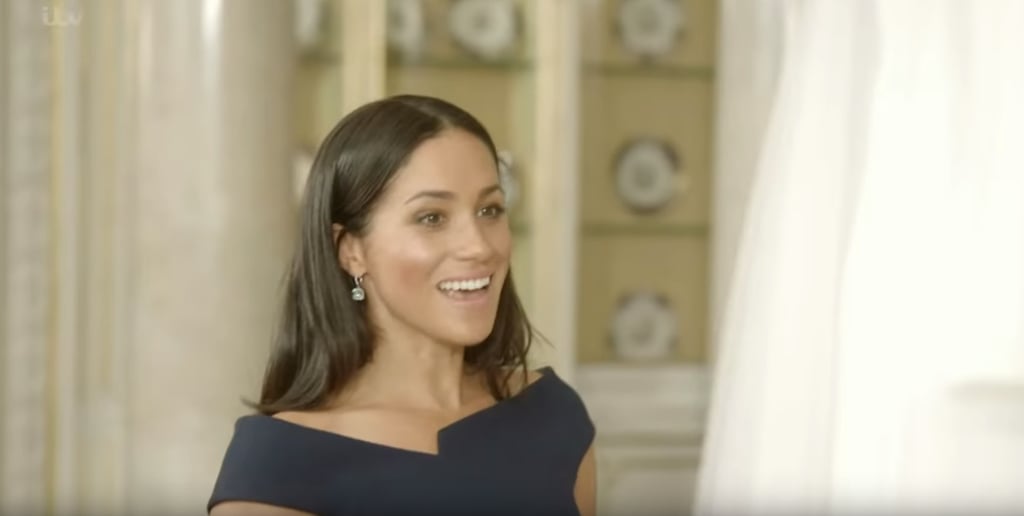 Jaws dropped all over the world when everyone laid eyes on Meghan Markle's stunning wedding dress on May 19, and the Duchess of Sussex had a similar reaction when she saw her gown, too. A clip for Queen of the World, a new documentary series focused on Queen Elizabeth, includes the moment that Meghan laid eyes on her completed Givenchy dress designed by Clare Waight Keller, and her reaction is priceless. 
Like many other brides who see their dress when it's finally ready to wear, Meghan's face showed pure awe and joy. After the reveal, Meghan let out an audible gasp, flashed a huge smile, and touched the delicate lace on her 16-foot-long silk veil.  Watch the clip ahead (Meghan's reaction starts around the 20-second mark), and revisit a few of the most memorable photos of the iconic wedding dress. 

    Related:

            
            
                                    
                            

            Meghan Markle Has Been Sporting This Signature Look Since Her Wedding — and We&apos;re in Love