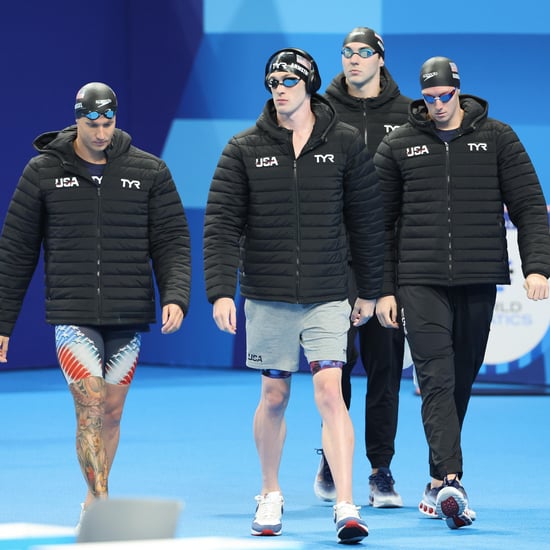 Why Olympic Swimmers Wear Coats Before a Race