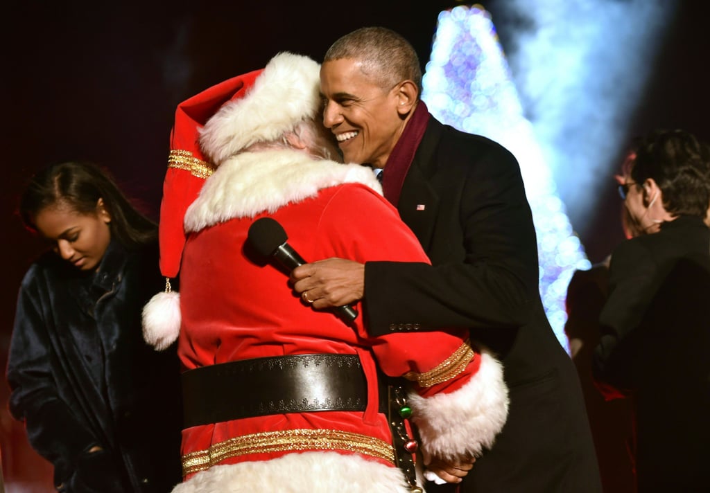 Over the last few years, President Barack Obama has always ensured that the National Christmas Tree Lighting Ceremony is a spectacular affair. In 2014, he broke it down with Fifth Harmony, and last year he brought along Reese Witherspoon and Miss Piggy to join in the fun. For his final appearance at the annual ceremony on Thursday night, Barack invited Eva Longoria, Marc Anthony, Chance the Rapper, Kelly Clarkson, and more to help him celebrate the season alongside First Lady Michelle Obama, and their daughter Sasha. The event, which took place at the Ellipse in President's Park, was full of laughter and song and included more than a few adorable moments between the president and the guest of the hour: Santa! They hugged, belted out a few carols, and reminded us all over again of how much we're going to miss the Obama family when they leave the White House. 

    Related:

            
                            
                    Michelle Obama Welcomes the Family&apos;s Last Christmas Tree at the White House
                
                            
                    Barack Obama, America&apos;s Chillest Dad, Says He&apos;s "Relaxed" About His Daughters Dating