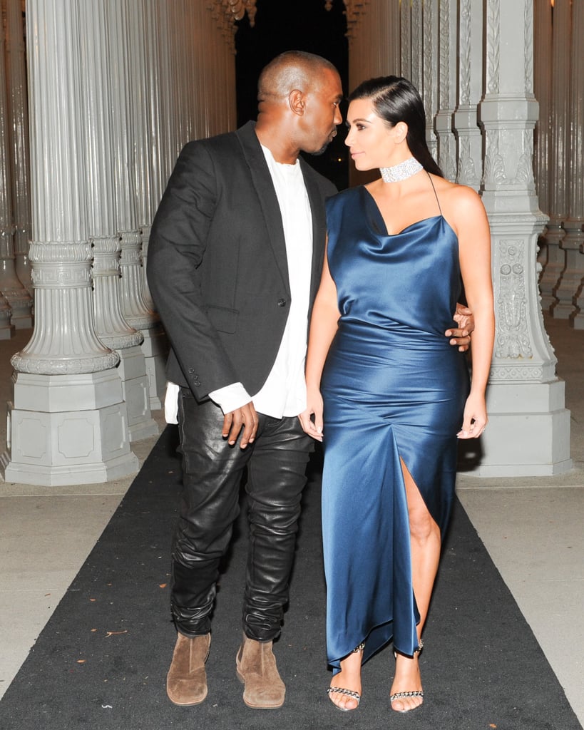 Last year, Kim completed her blue satin Cushnie et Ochs design with a Cartier diamond choker.